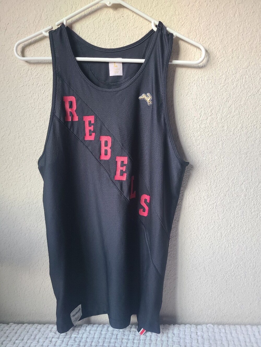 Tracksmith Black Tank Top with Pink "REBELS" Lettering